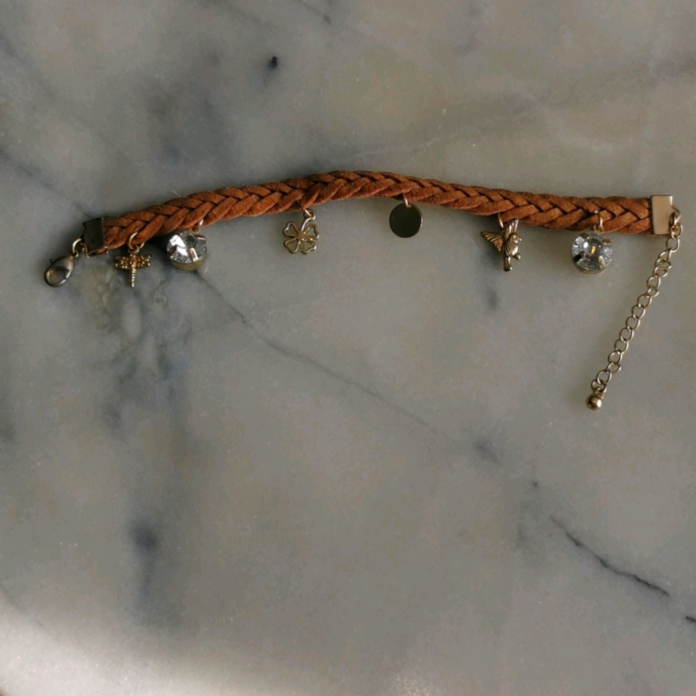 Rope bracelet with gold charms